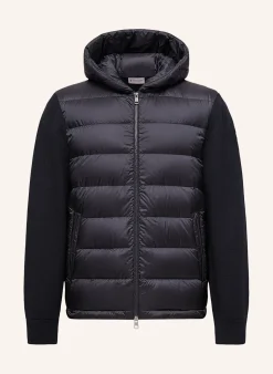 Daunenjacke im Materialmix