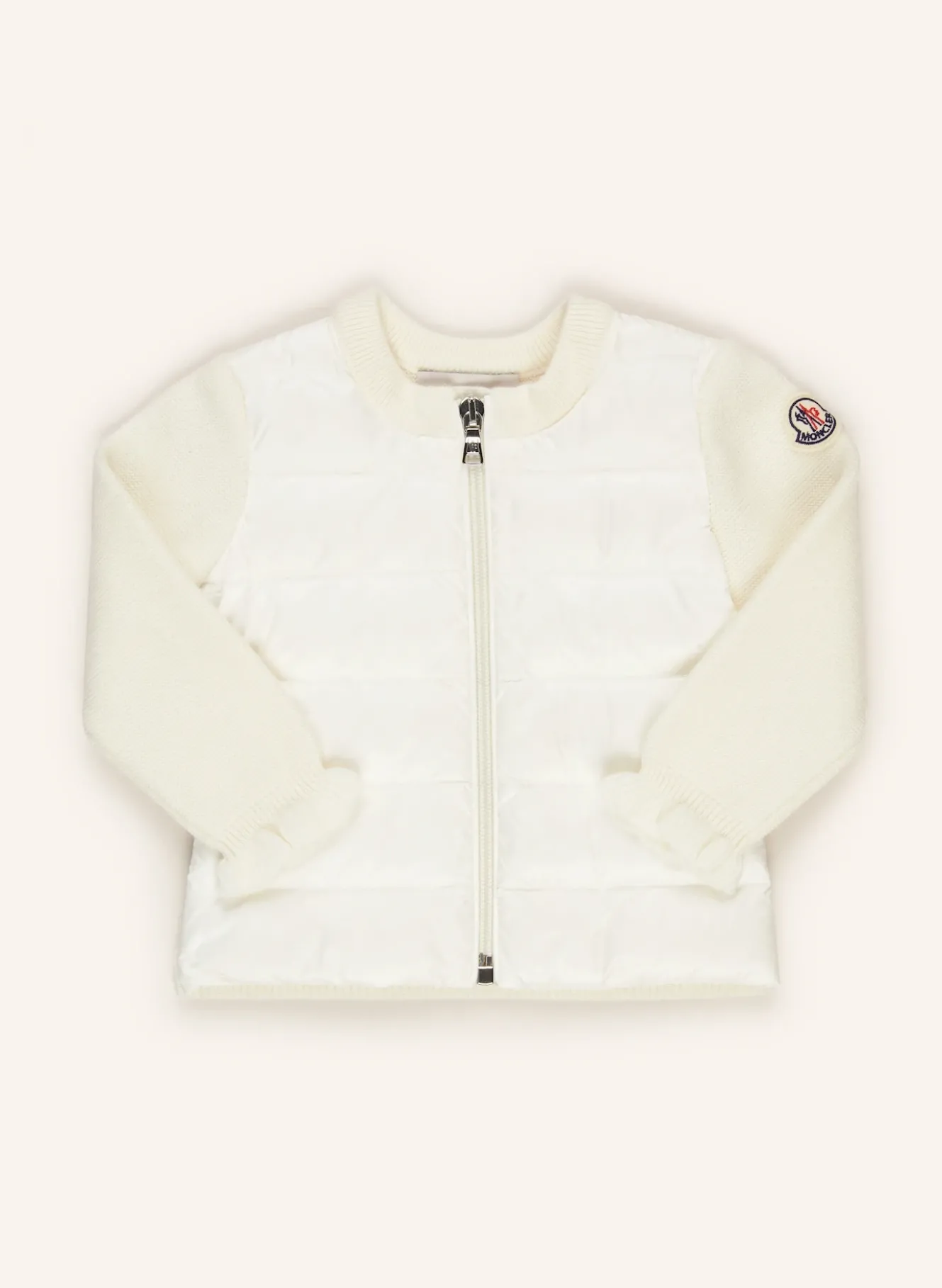 Daunenjacke im Materialmix
