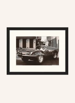 Wandbild STEVE MCQUEEN IN SEINEM JAGUAR mit Rahmen